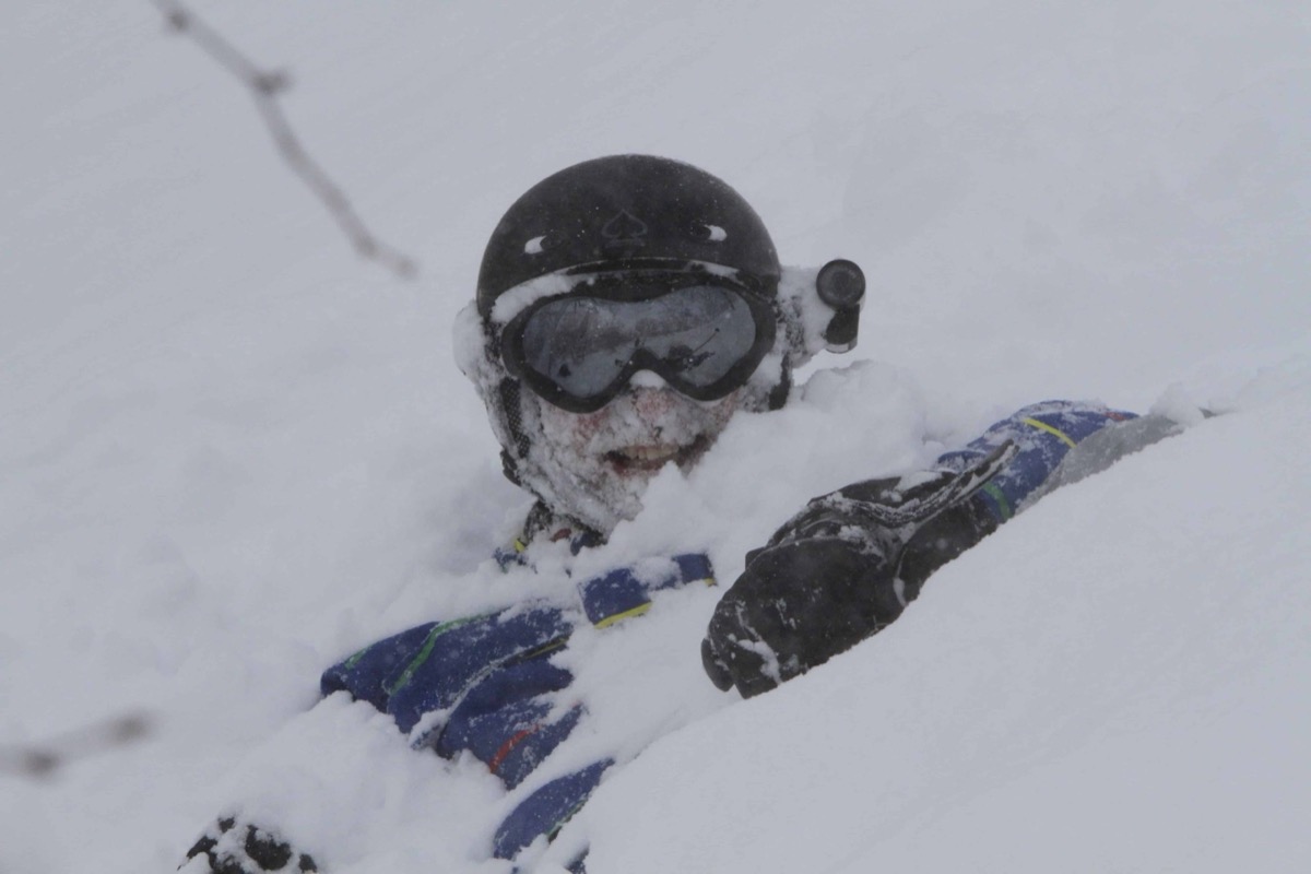 Skier in deep powder snow in Hokkaido, Japan