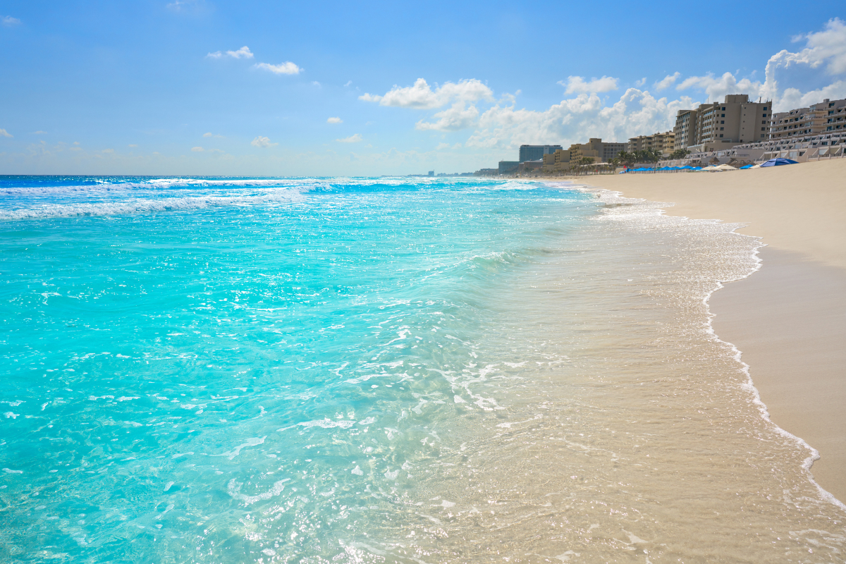 The iconic turquoise water and white sand beaches of Cancún, Mexico