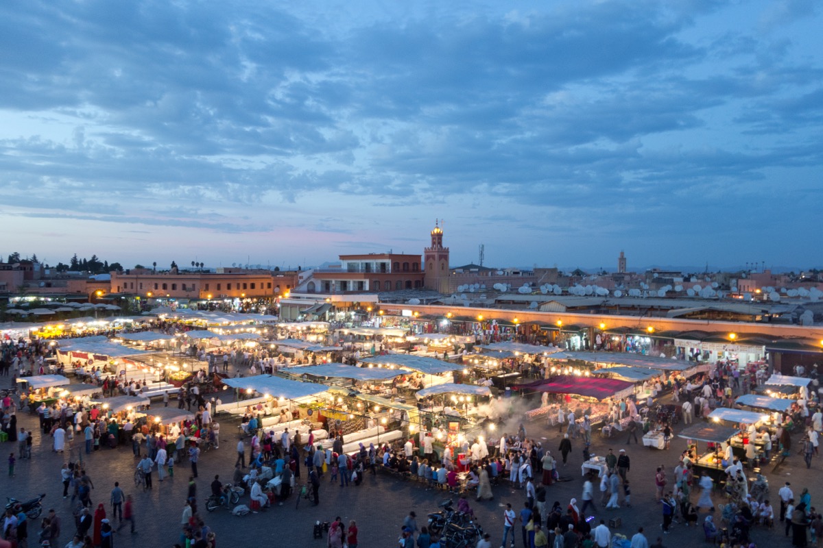 The bustling Jemaa el-Fnaa square in Marrakech at dusk