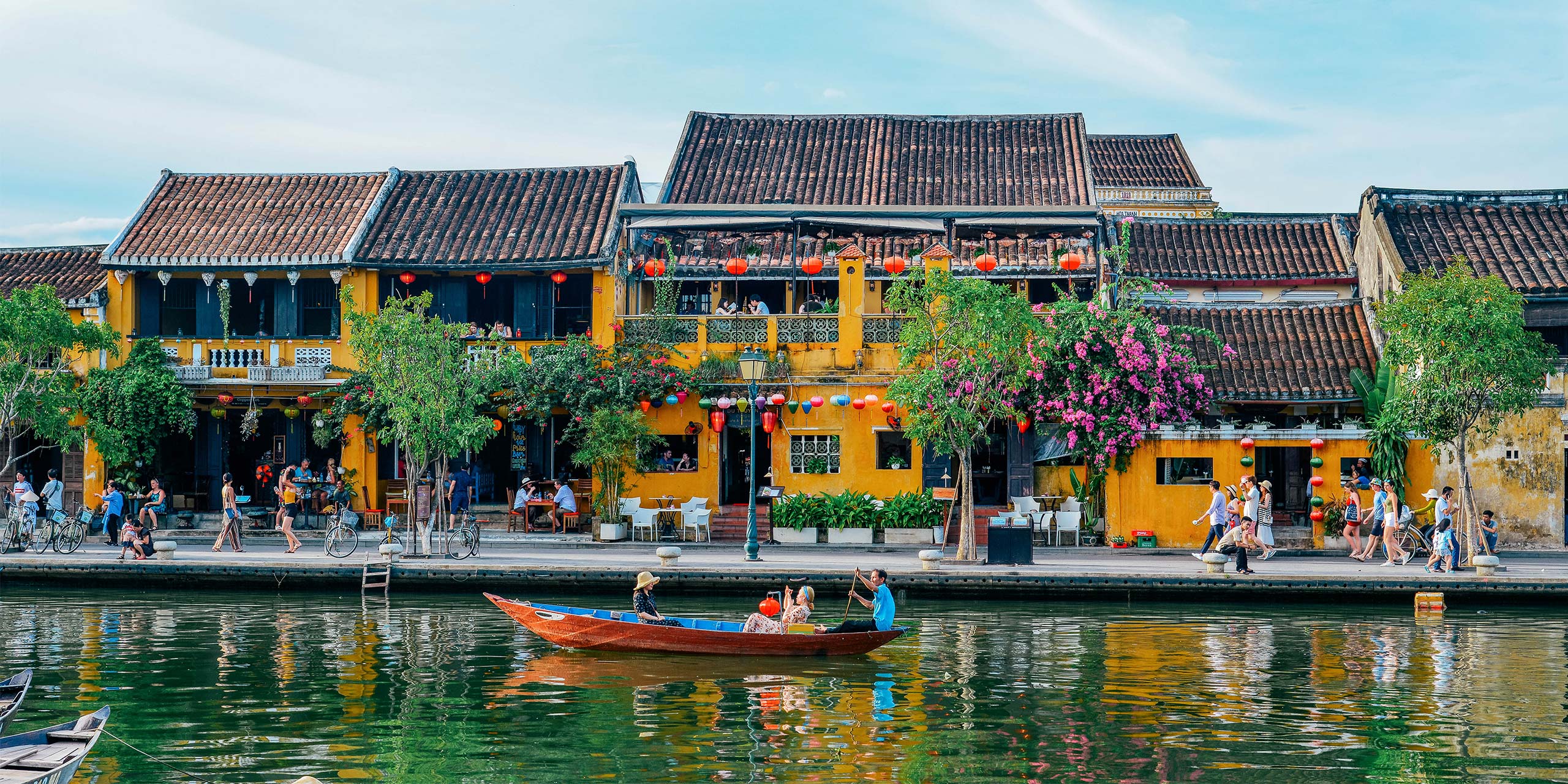 Colorful lanterns hanging over the ancient streets of Hoi An at night, Vietnam