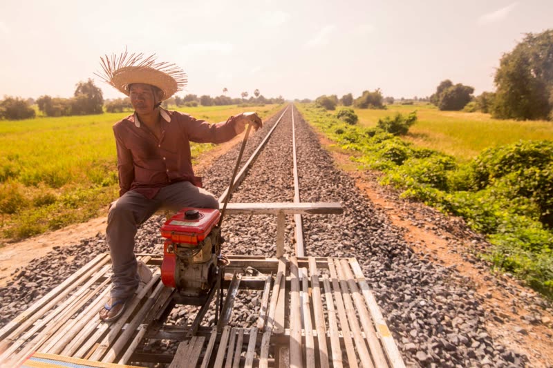 Battambang bamboo train (norry) riding through Cambodian countryside