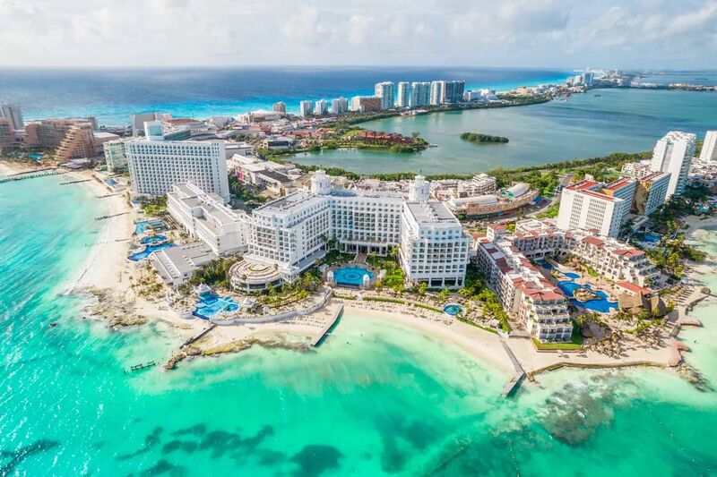 Cancun Hotel Zone aerial view showing the turquoise Caribbean and resort strip