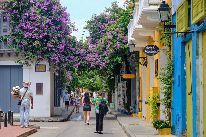 Colorful colonial streets of Cartagena's Getsemaní neighborhood with murals and vibrant facades