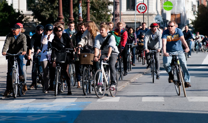 Cyclists on a Copenhagen street, representing the city's world-famous bike culture