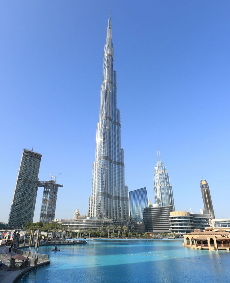 Dubai Burj Khalifa rising above the downtown skyline — the world's tallest building beside the Dubai Fountain