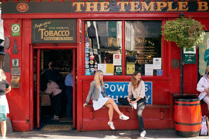 Temple Bar district in Dublin with colorful Victorian pub facades — the heart of Dublin's nightlife and culture
