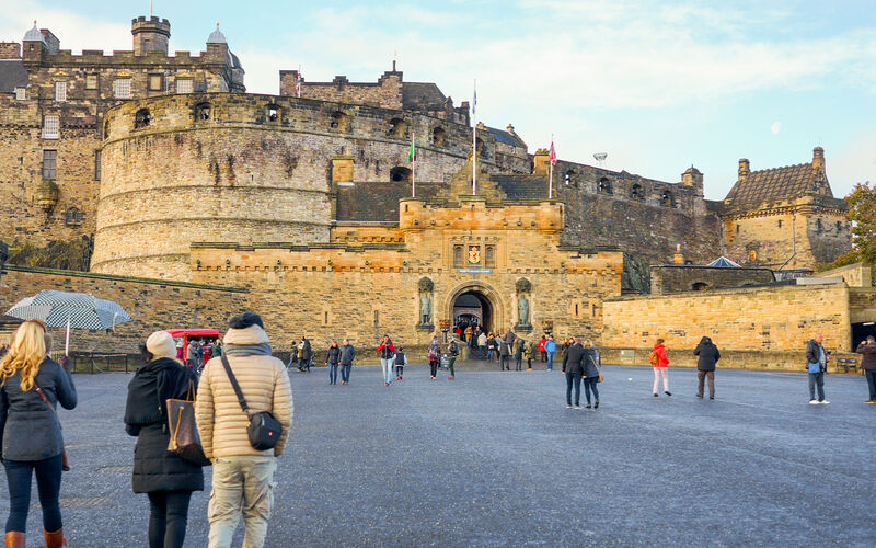 Edinburgh Castle perched on volcanic rock above the Old Town — Scotland's most visited attraction