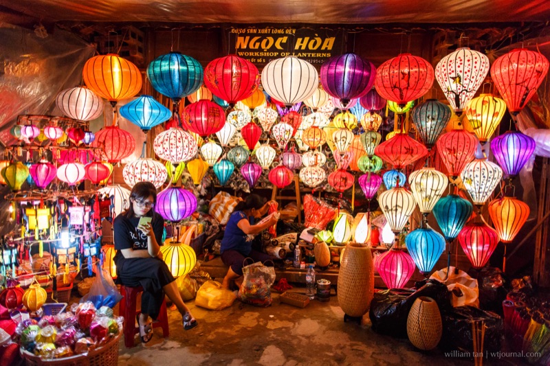 Hoi An Ancient Town at night — colorful paper lanterns reflected on the Thu Bon River