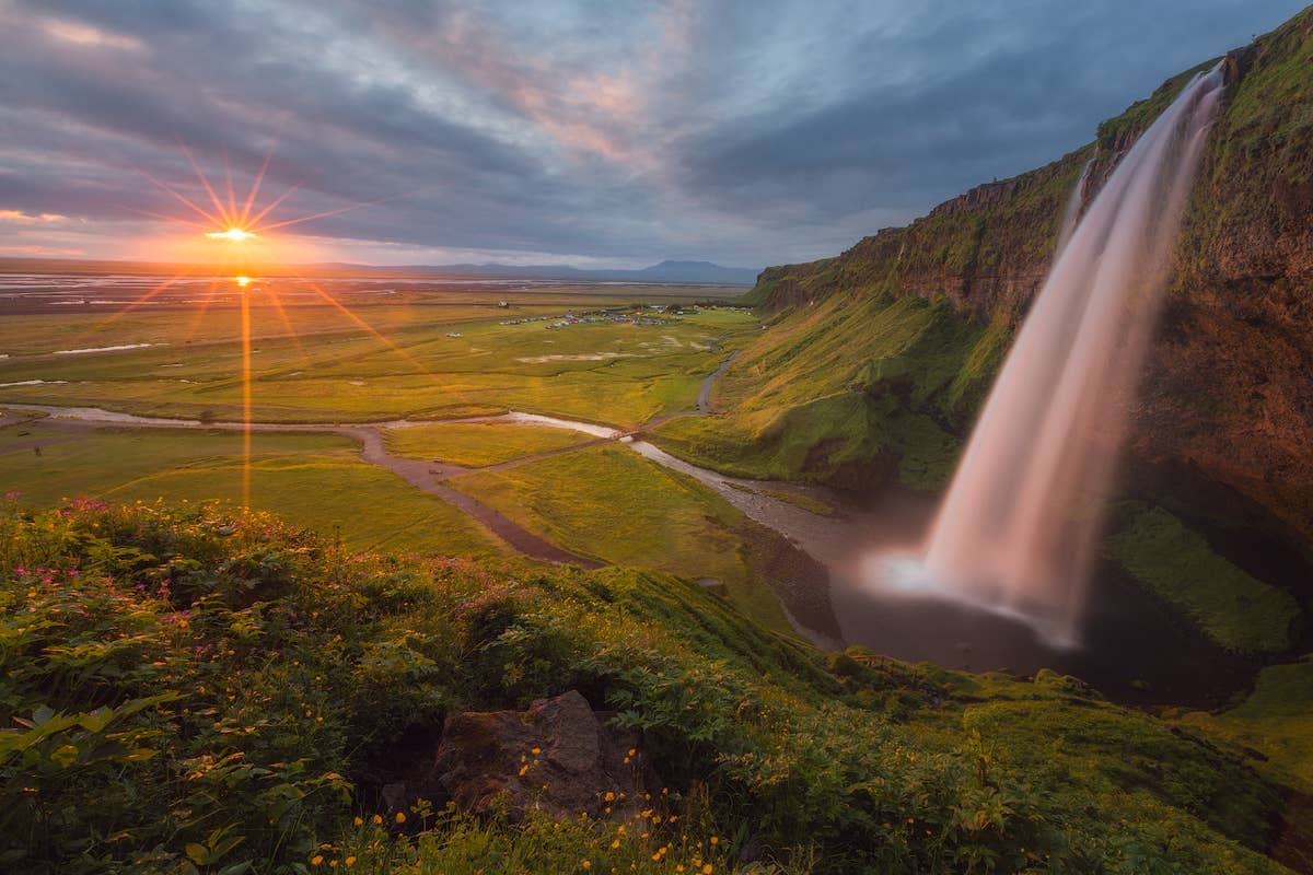 Seljalandsfoss waterfall in southern Iceland — one of the few waterfalls you can walk behind