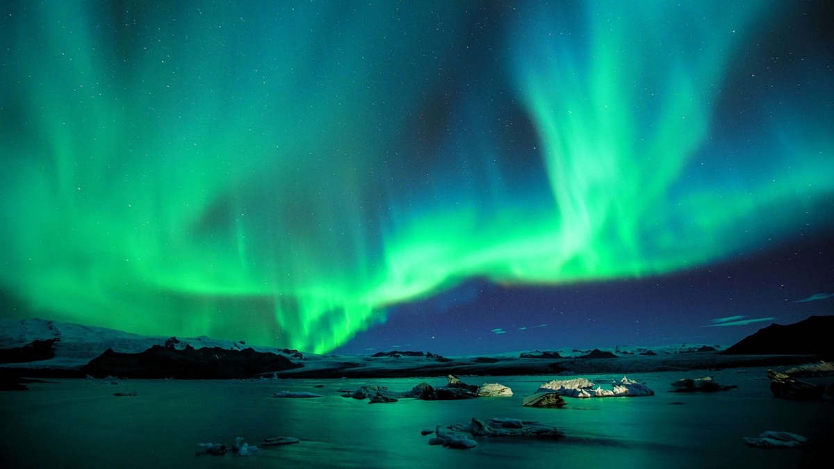Northern lights (aurora borealis) over Iceland's glacier lagoon