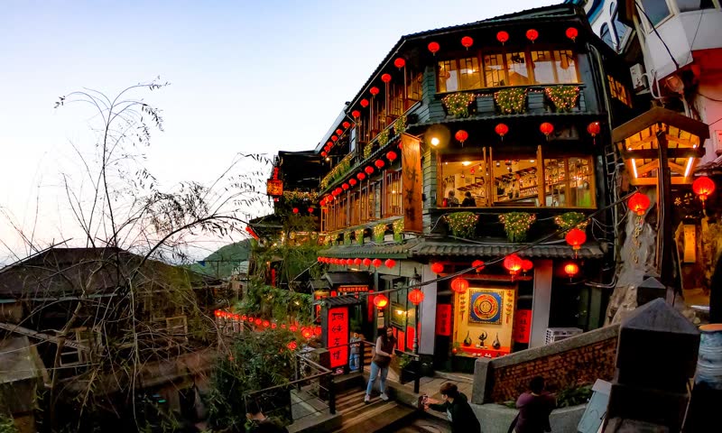 A-Mei Tea House in Jiufen with red lanterns hanging overhead in the mountain village