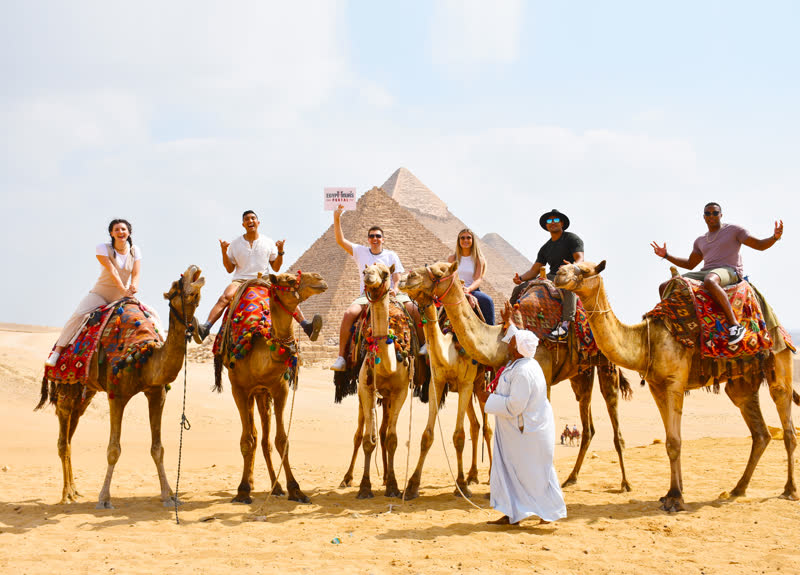 Great Pyramids of Giza, Egypt with camels in the foreground