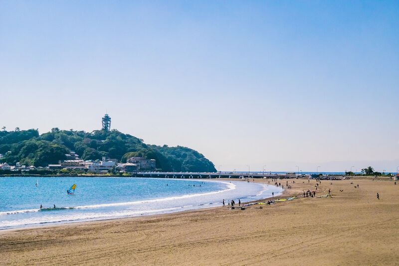 Kamakura coastline and Enoshima island viewed from the beach, Kanagawa, Japan