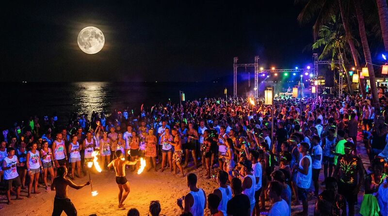 Full Moon Party at Haad Rin beach, Koh Phangan — thousands of partygoers on the beach