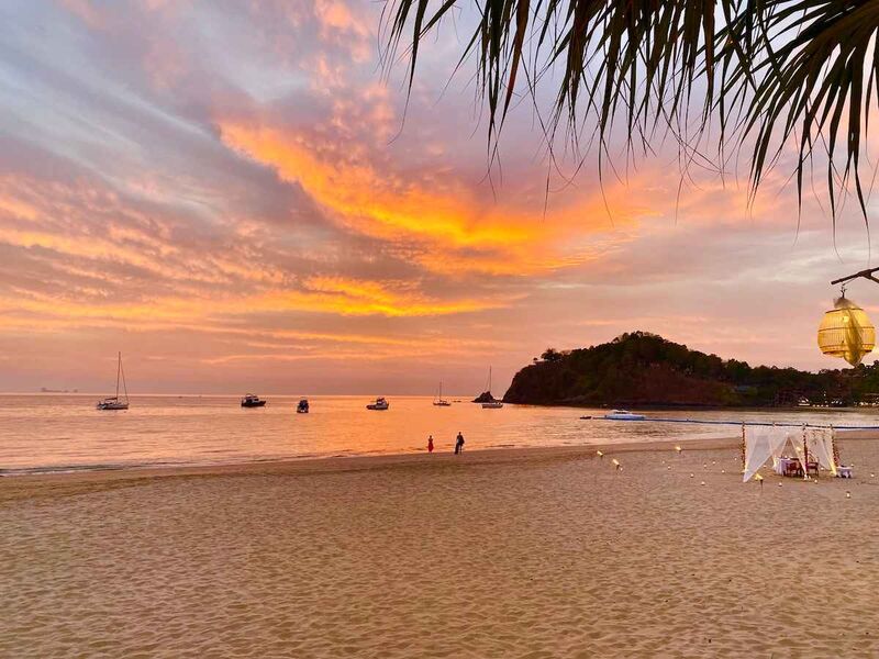 Golden sunset over a quiet beach on Koh Lanta, Thailand