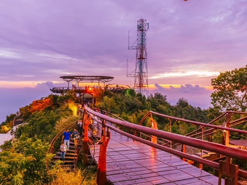 Langkawi cable car and SkyBridge — aerial view of rainforest and Andaman Sea from Gunung Mat Cincang