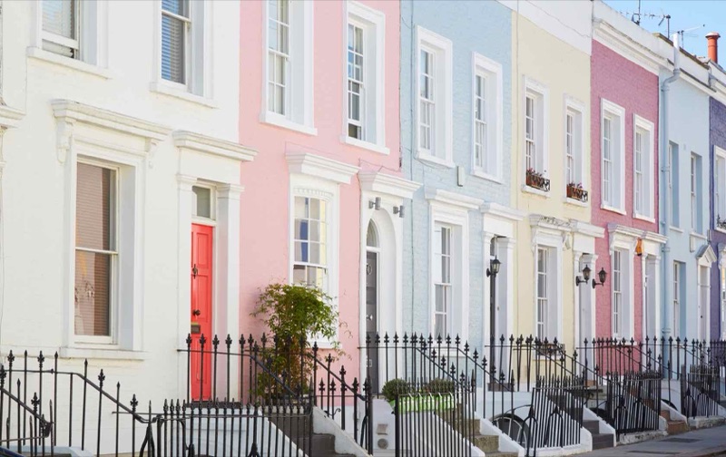 Colorful pastel houses lining the streets of Notting Hill, London