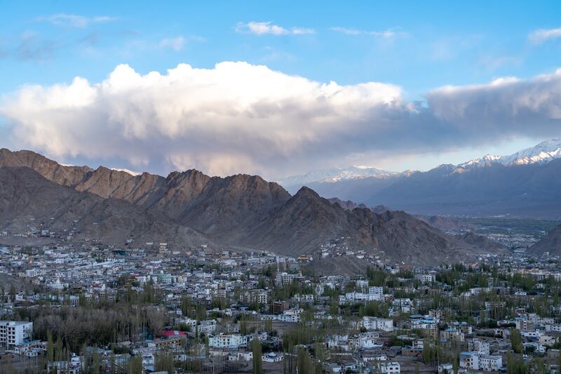 Panoramic view of Leh city from above showing the stark high-altitude Himalayan landscape at 3,524 meters