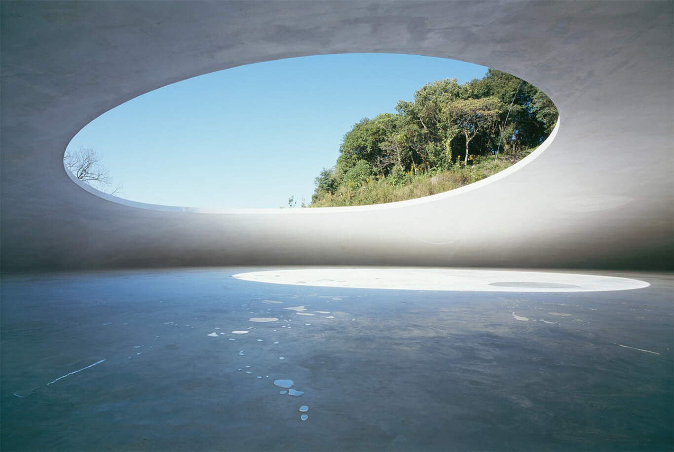 Teshima Art Museum's concrete shell with sky opening, Setouchi islands