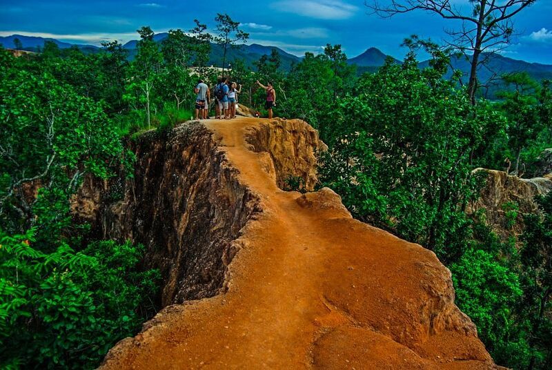 Winding mountain road from Chiang Mai to Pai with 762 curves through forested hills