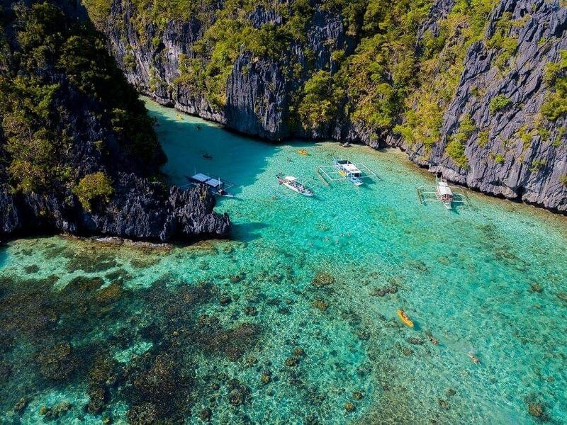 Big Lagoon in El Nido, Palawan — turquoise waters surrounded by towering limestone cliffs