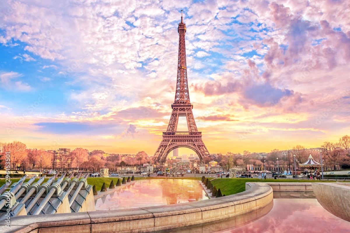Eiffel Tower at sunset in Paris — golden light over the City of Light
