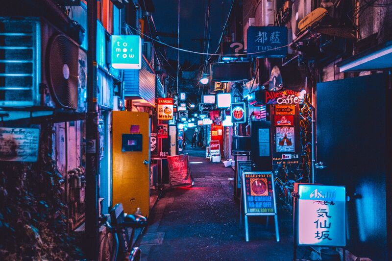 Golden Gai Shinjuku Tokyo narrow alleyways packed with tiny bars and neon lights at night
