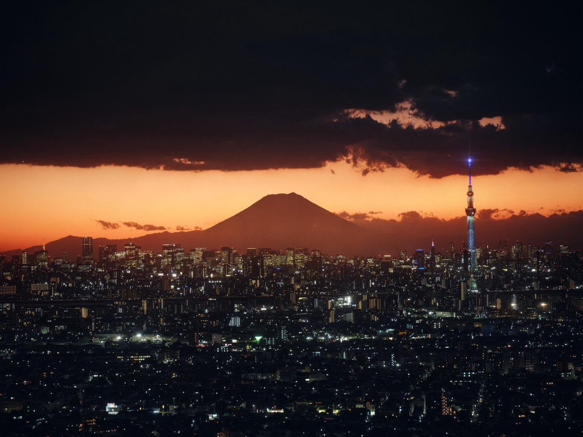Tokyo skyline at sunset with Mount Fuji in the background