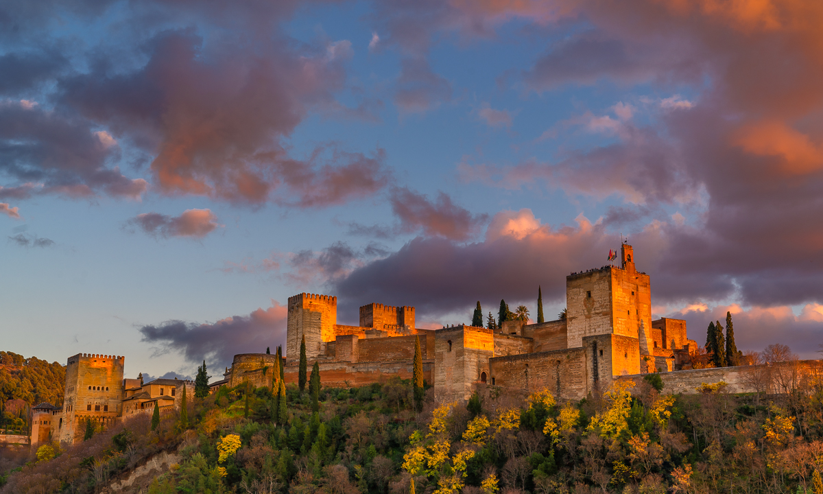 The Alhambra Palace at sunset, Granada, Spain — intricate Moorish architecture