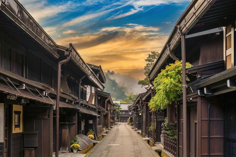 Takayama's Sanmachi Suji historic district with traditional wooden merchant houses lining a narrow street