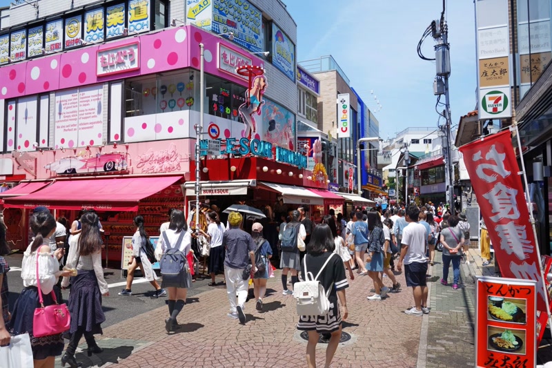 Harajuku street in Tokyo with colorful fashion boutiques and vibrant atmosphere