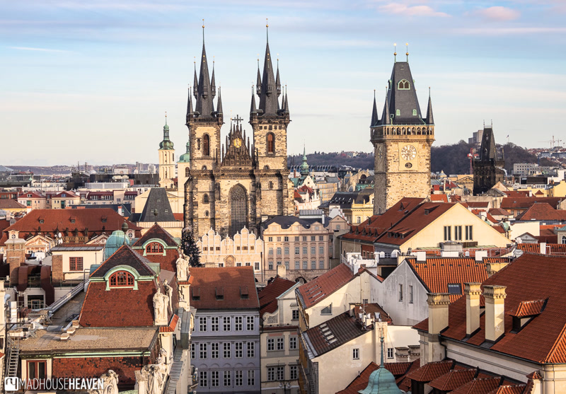 Prague's Charles Bridge crossing the Vltava River with Hradčany Castle visible on the hilltop above