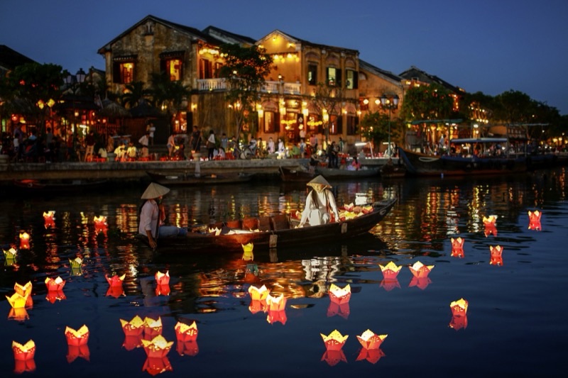 Hoi An ancient town lit by colorful lanterns at night, Vietnam