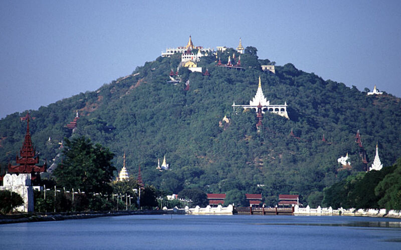 Mandalay Hill Myanmar — Buddhist pagodas and shrines atop Mandalay Hill with views of the royal palace city below