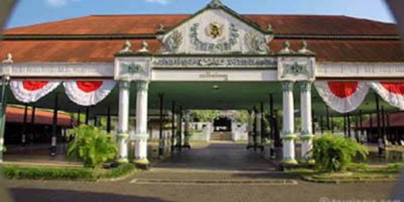 Kraton Yogyakarta Sultan's Palace interior courtyard — traditional Javanese architecture with ornate wooden pillars