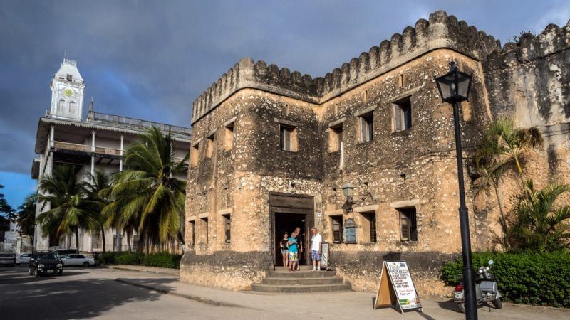 Historic coral stone architecture and carved wooden doors of Stone Town, Zanzibar's UNESCO-listed old city