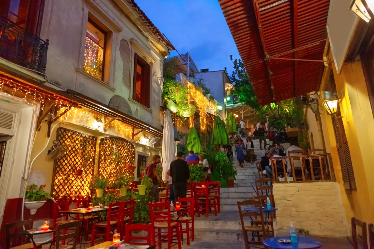 Plaka neighborhood Athens narrow streets and tavernas at night
