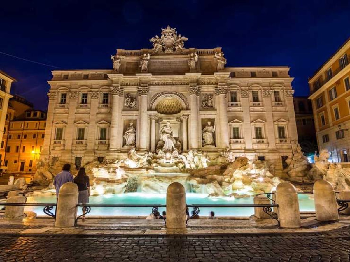 Trevi Fountain illuminated at evening in Rome, Italy