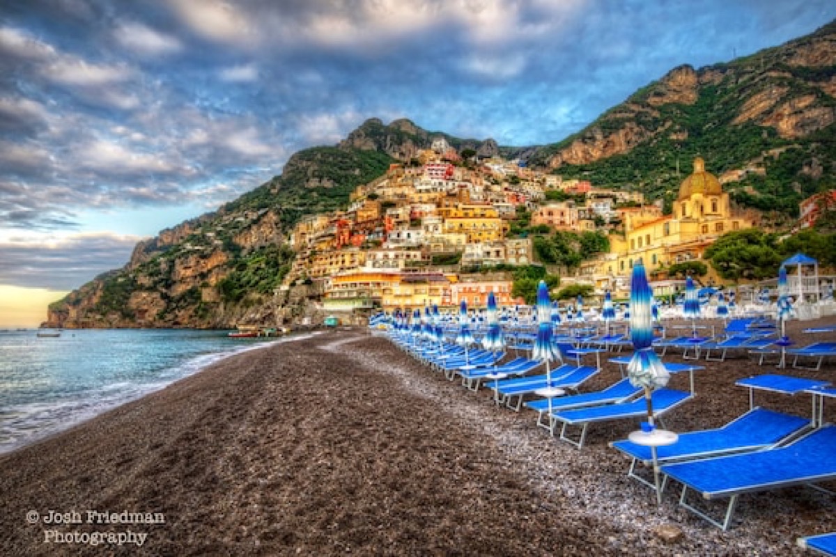 Colorful cliffside buildings of Positano cascading to the Amalfi Coast