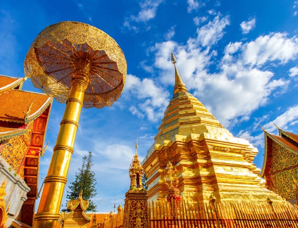 Doi Suthep golden pagoda against blue sky Chiang Mai