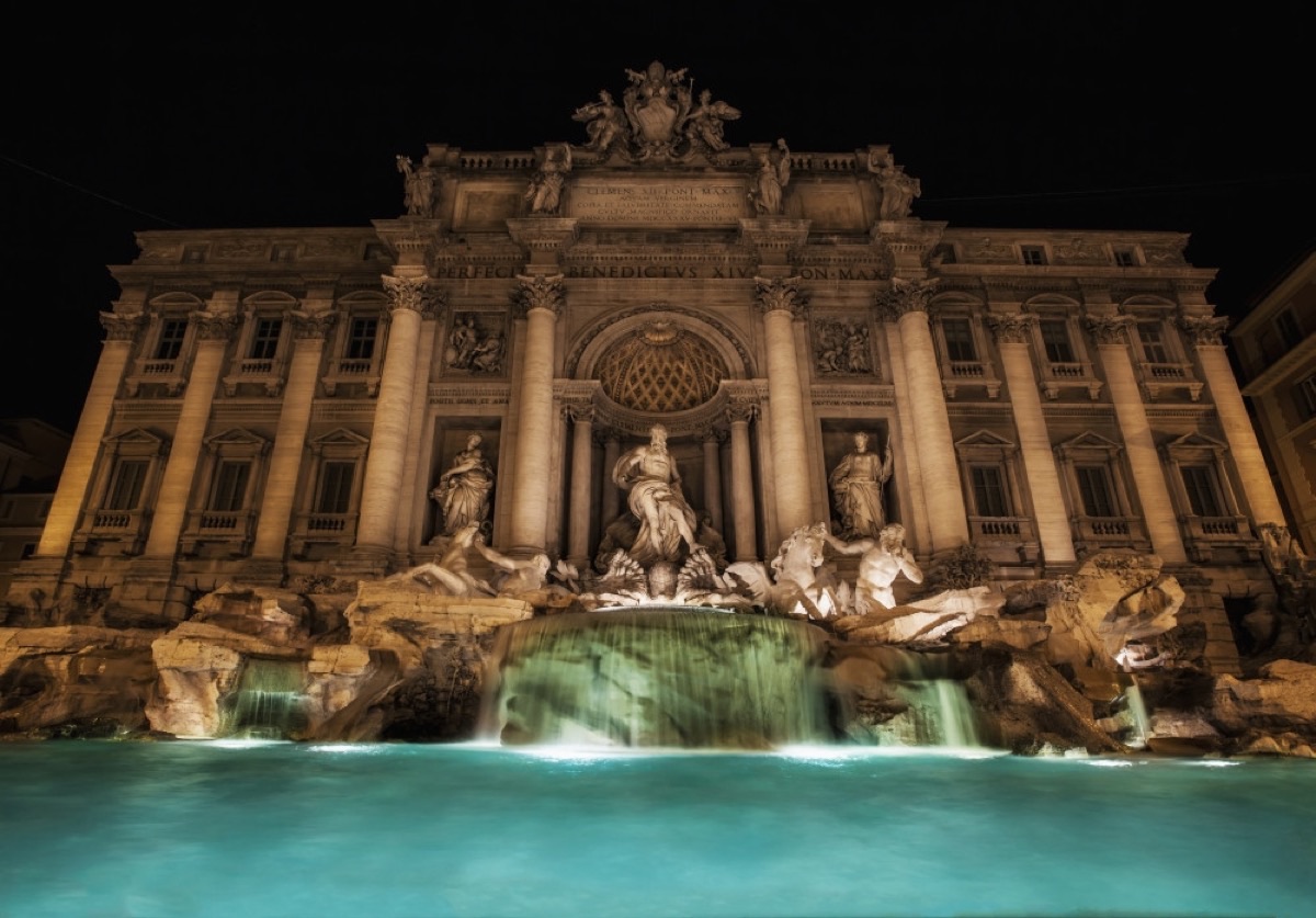 Trevi Fountain illuminated at night, Rome Italy