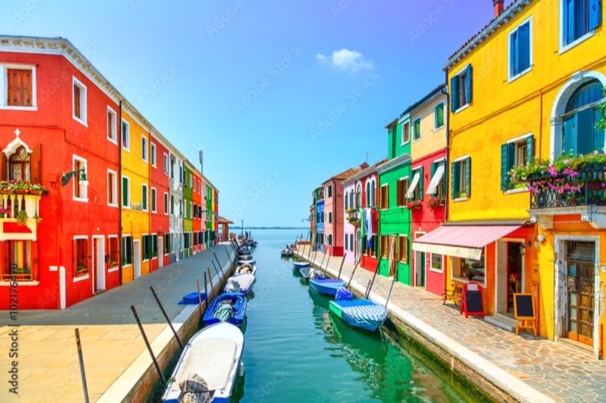 Colorful houses along the canals of Burano, Venice Italy