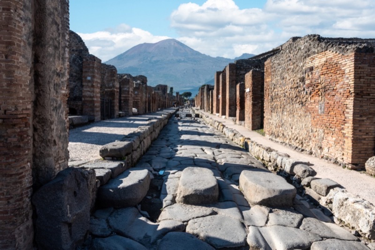 Ancient streets of Pompeii with Mount Vesuvius, Italy