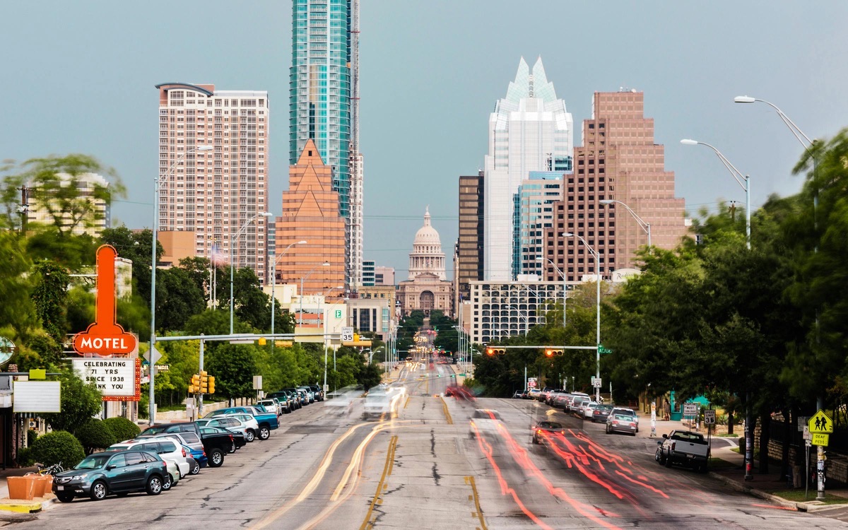 South Congress Avenue Austin with Capitol dome view and iconic Austin Motel sign