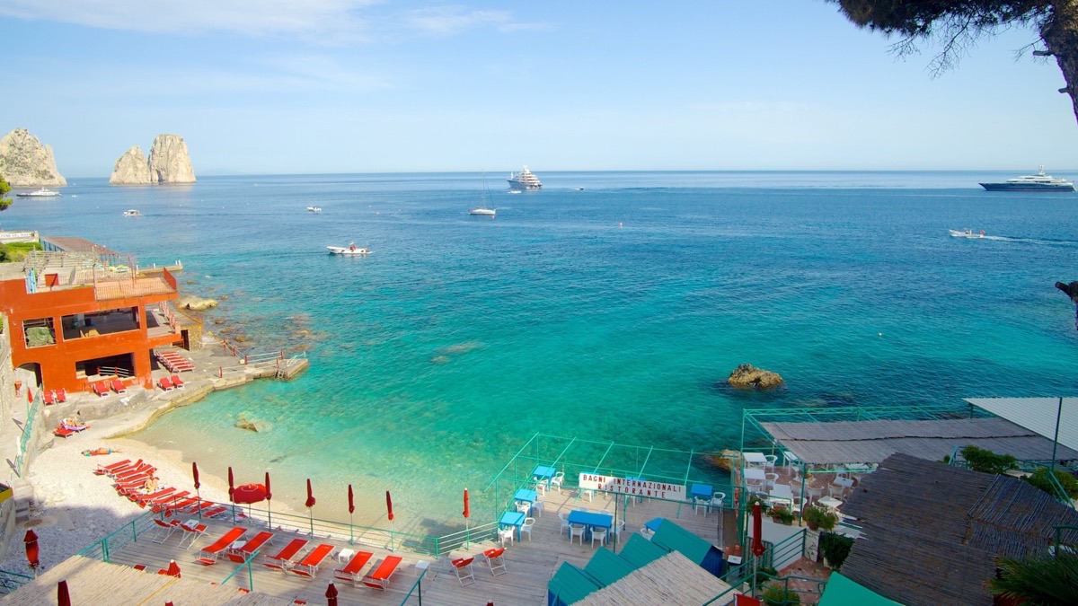 Capri Marina Piccola with Faraglioni rocks and turquoise Mediterranean sea