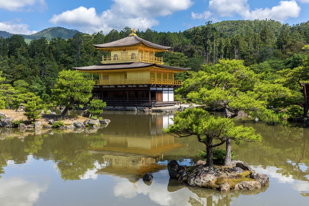 Kinkaku-ji Golden Pavilion reflected in mirror pond, Kyoto