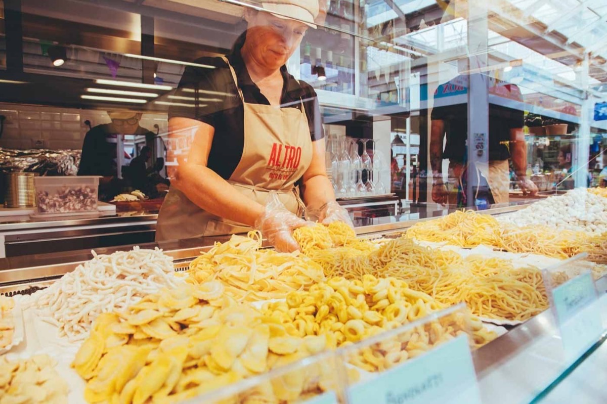 Fresh pasta and artisan food stalls at Testaccio Market in Rome