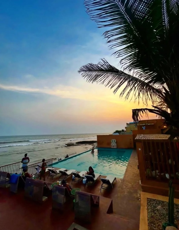Sandbox Beach Club sunset infinity pool with ocean views in La Pleasure Beach, Accra