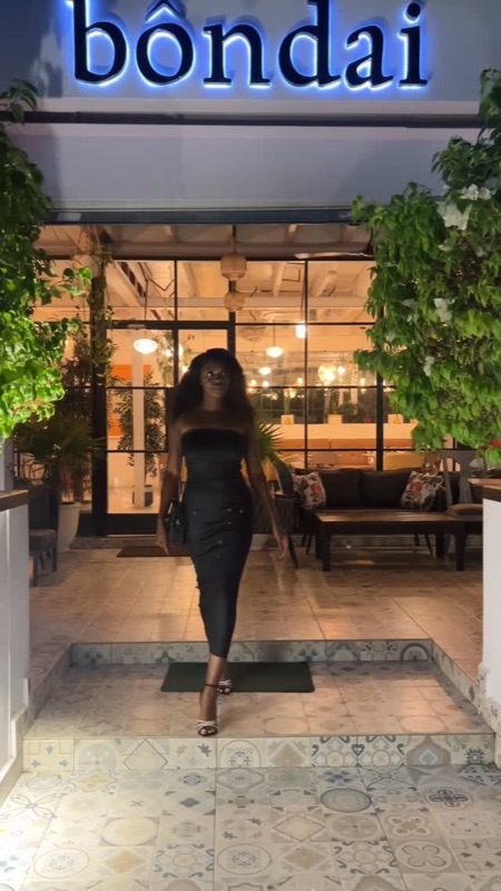 Bôndai restaurant entrance with illuminated sign in Osu, Accra