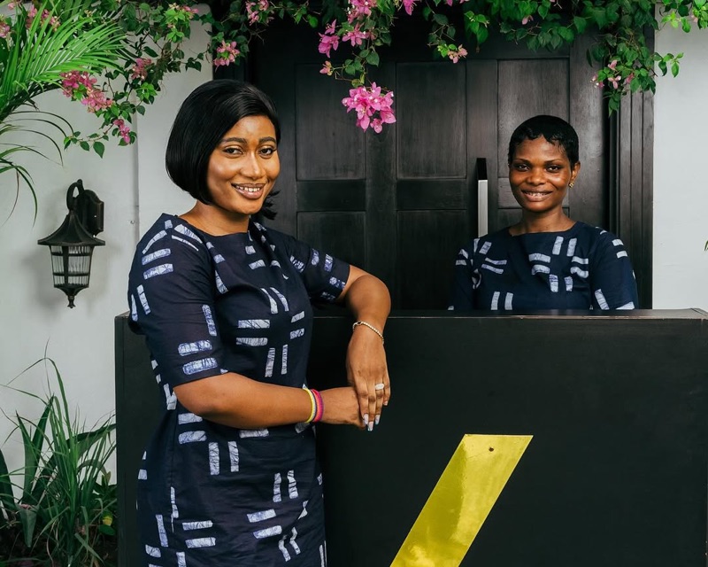 Front/Back private membership club entrance with staff in Osu, Accra